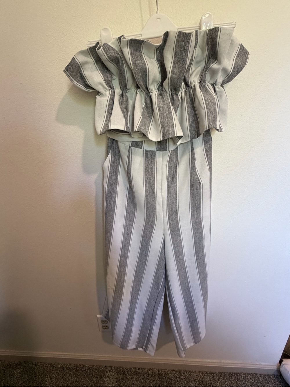 Striped Off-Shoulder Ruffle Jumpsuit in Gray and White